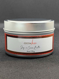 CocoaLuxe hand-poured soy and cocoa butter wax candle in 6 oz tin, front view